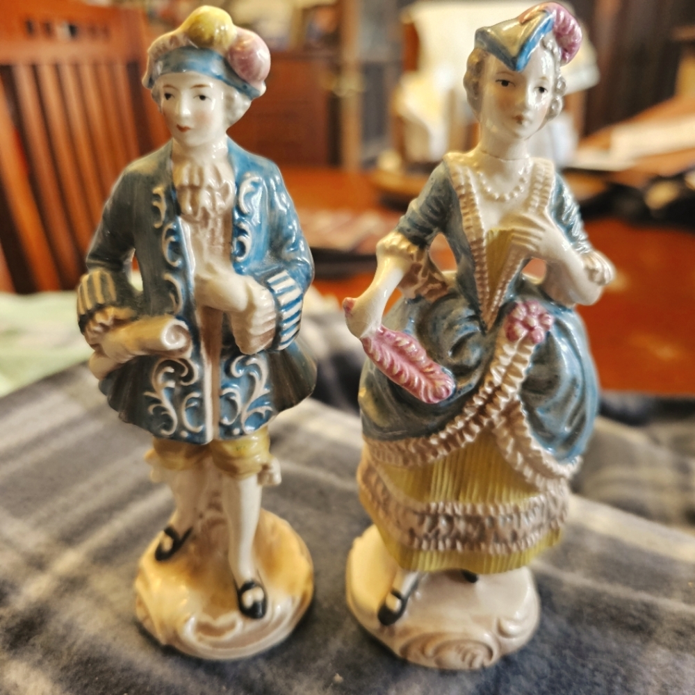 Vintage W Goebel Figurine. From the Going Out Series. This is sold as a pair.